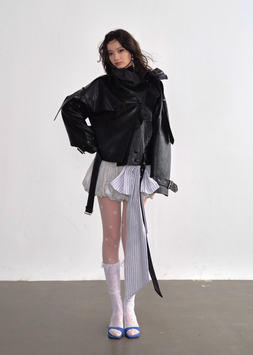 JNYLON faux leather jacket women, Korean stylish leather outerwear, stand collar PU jacket Korean fashion, edgy ruffle leather jacket women, modern Korean street chic jacket, oversized faux leather biker jacket women, trendy Korean fashion outerwear, playful structured leather jacket, chic Korean style faux leather coat, statement urban fashion jacket women