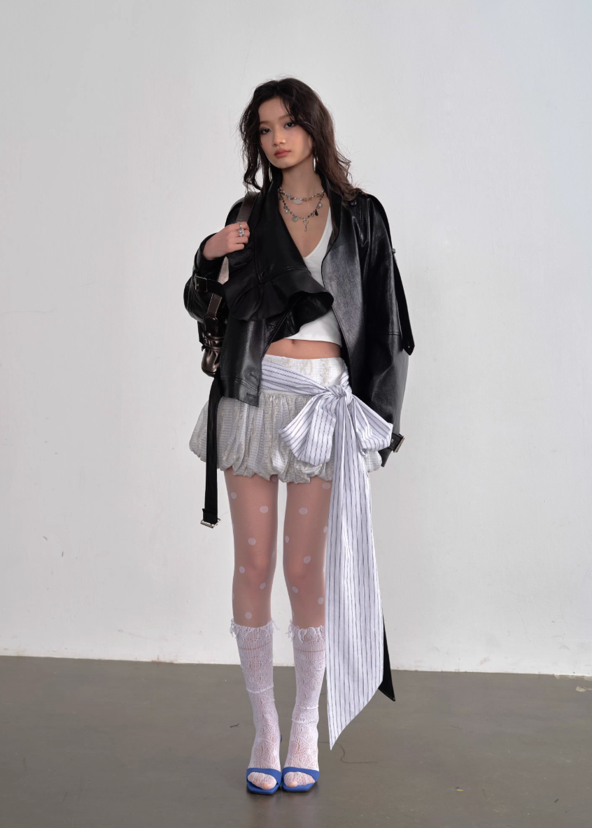 JNYLON faux leather jacket women, Korean stylish leather outerwear, stand collar PU jacket Korean fashion, edgy ruffle leather jacket women, modern Korean street chic jacket, oversized faux leather biker jacket women, trendy Korean fashion outerwear, playful structured leather jacket, chic Korean style faux leather coat, statement urban fashion jacket women