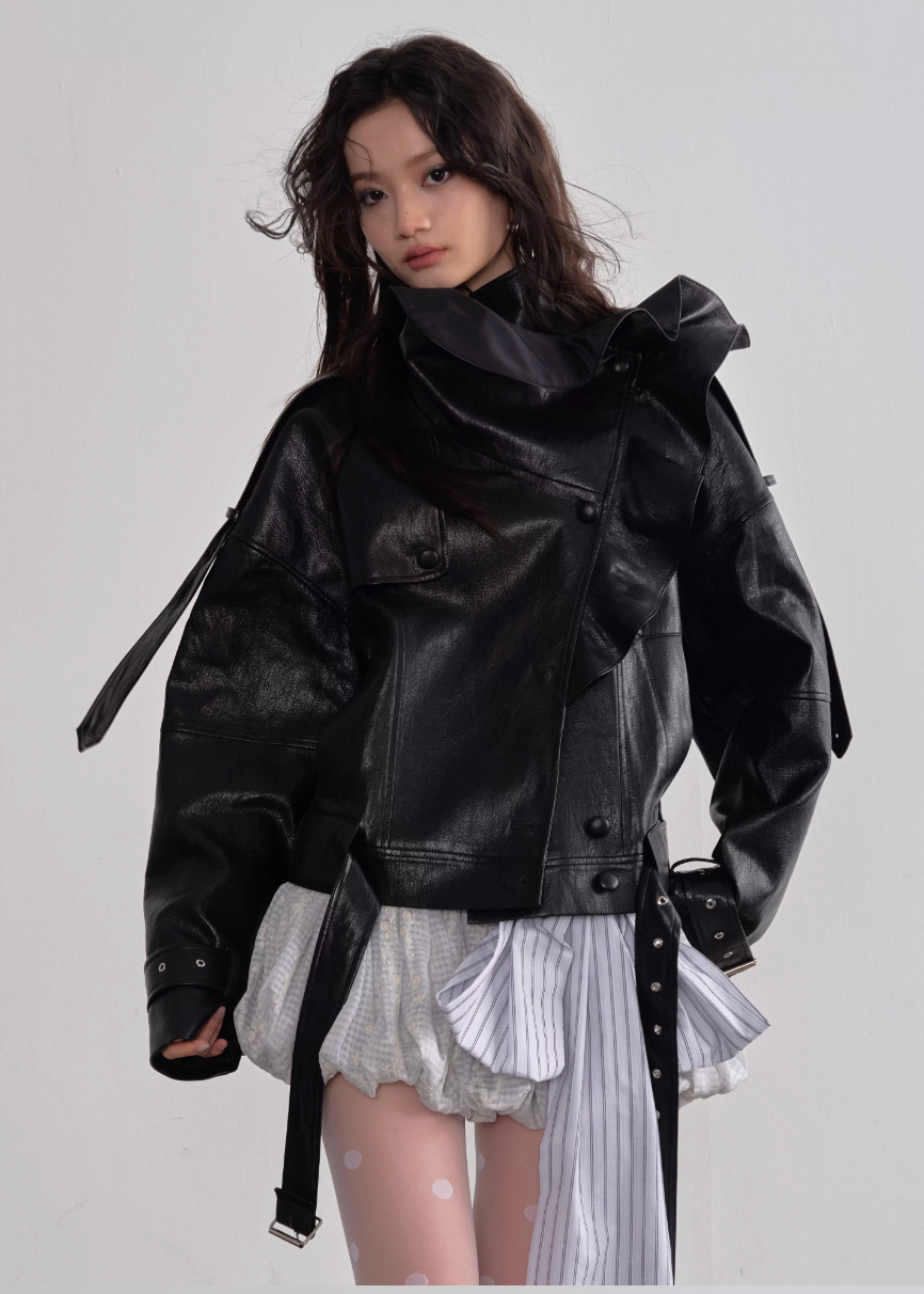 JNYLON faux leather jacket women, Korean stylish leather outerwear, stand collar PU jacket Korean fashion, edgy ruffle leather jacket women, modern Korean street chic jacket, oversized faux leather biker jacket women, trendy Korean fashion outerwear, playful structured leather jacket, chic Korean style faux leather coat, statement urban fashion jacket women