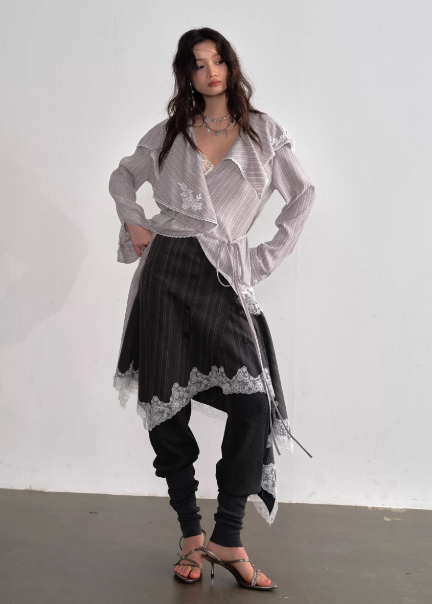JNYLON asymmetric long shirt women, Korean stylish lace stripe blouse, modern Korean fashion long shirt, chic ruffle stripe layering piece, vintage inspired lace long blouse, trendy Korean street chic outfit, lightweight striped long shirt women, urban Korean fashion layering top, stylish oversized long blouse Korean style, lace applique long shirt women