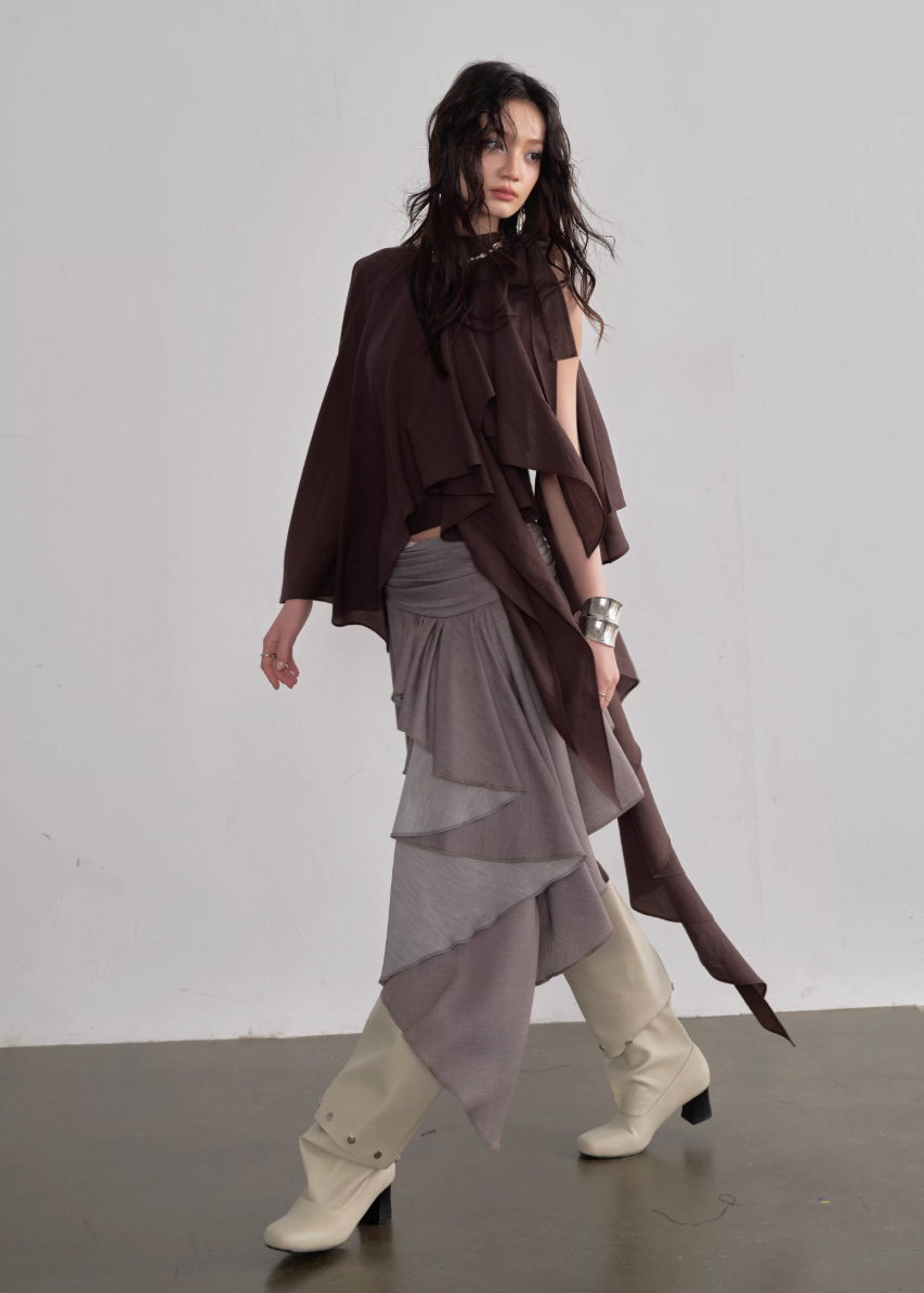 JNYLON asymmetric cape top women, Korean stylish lace up camisole, modern Korean fashion off shoulder blouse, chic layered cape top women, trendy Korean street chic outfit, natural atmosphere draped top Korean style, lightweight asymmetric fashion top women, urban fashion cape camisole, stylish Korean aesthetic blouse, fashionable layered camisole women