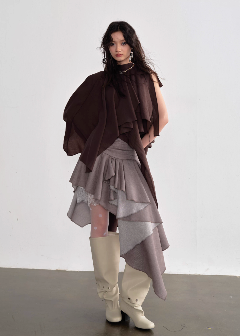 JNYLON pleated linen skirt women, Korean stylish asymmetric skirt, modern Korean fashion layered skirt, chic retro romantic pleated skirt women, trendy Korean street chic outfit, linen blend irregular skirt Korean style, lightweight pleated fashion skirt women, urban fashion asymmetric skirt, stylish Korean aesthetic skirt, fashionable natural tone pleated skirt