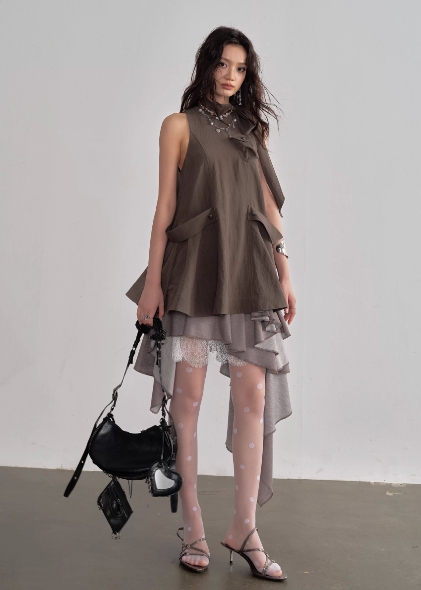 JNYLON pleated linen skirt women, Korean stylish asymmetric skirt, modern Korean fashion layered skirt, chic retro romantic pleated skirt women, trendy Korean street chic outfit, linen blend irregular skirt Korean style, lightweight pleated fashion skirt women, urban fashion asymmetric skirt, stylish Korean aesthetic skirt, fashionable natural tone pleated skirt