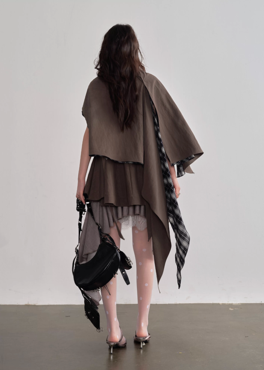 JNYLON pleated linen skirt women, Korean stylish asymmetric skirt, modern Korean fashion layered skirt, chic retro romantic pleated skirt women, trendy Korean street chic outfit, linen blend irregular skirt Korean style, lightweight pleated fashion skirt women, urban fashion asymmetric skirt, stylish Korean aesthetic skirt, fashionable natural tone pleated skirt