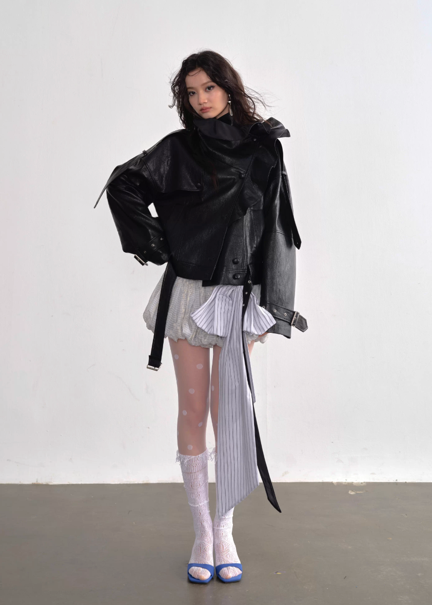 JNYLON ballet style mini skirt, Korean stylish puffy skirt, embroidered bow lace-up skirt women, playful age-reducing skirt Korean fashion, chic Korean street mini skirt, modern Korean fashion puffy skirt, trendy ribbon detail skirt women, lightweight layered mini skirt, urban ballet inspired skirt, fashionable Korean aesthetic skirt women