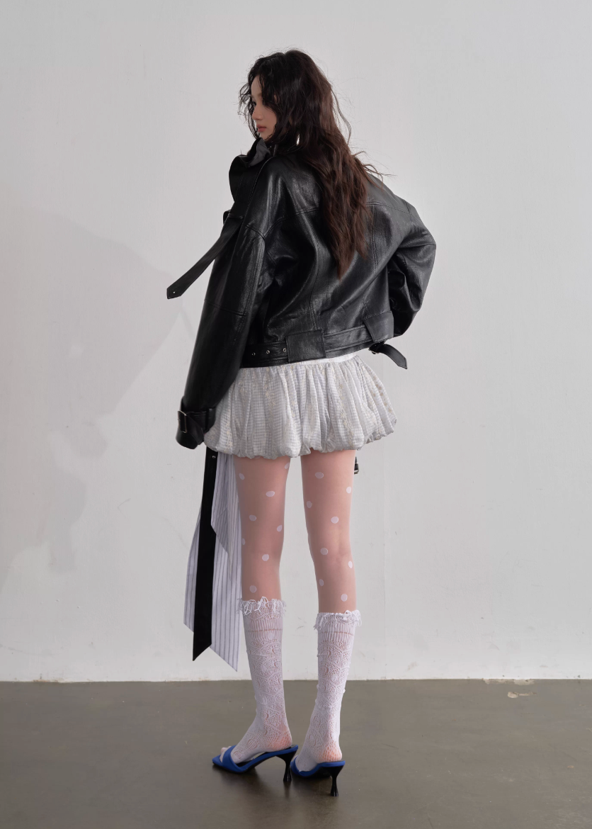 JNYLON ballet style mini skirt, Korean stylish puffy skirt, embroidered bow lace-up skirt women, playful age-reducing skirt Korean fashion, chic Korean street mini skirt, modern Korean fashion puffy skirt, trendy ribbon detail skirt women, lightweight layered mini skirt, urban ballet inspired skirt, fashionable Korean aesthetic skirt women