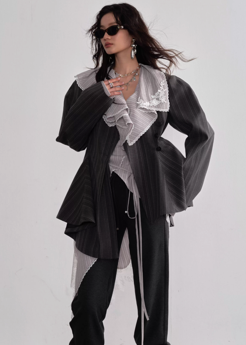 JNYLON asymmetric gray blazer women, Korean stylish tailored jacket, modern Korean fashion blazer, chic striped silhouette blazer, trendy Korean street chic outerwear, oversized gray blazer Korean style, urban fashion layering jacket women, stylish asymmetric tailored coat, minimalist Korean fashion blazer women, contemporary Korean blazer outfit