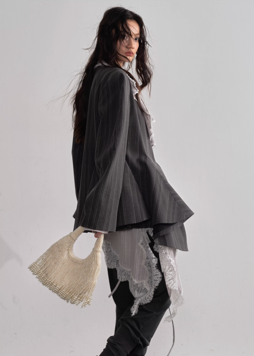 JNYLON asymmetric gray blazer women, Korean stylish tailored jacket, modern Korean fashion blazer, chic striped silhouette blazer, trendy Korean street chic outerwear, oversized gray blazer Korean style, urban fashion layering jacket women, stylish asymmetric tailored coat, minimalist Korean fashion blazer women, contemporary Korean blazer outfit