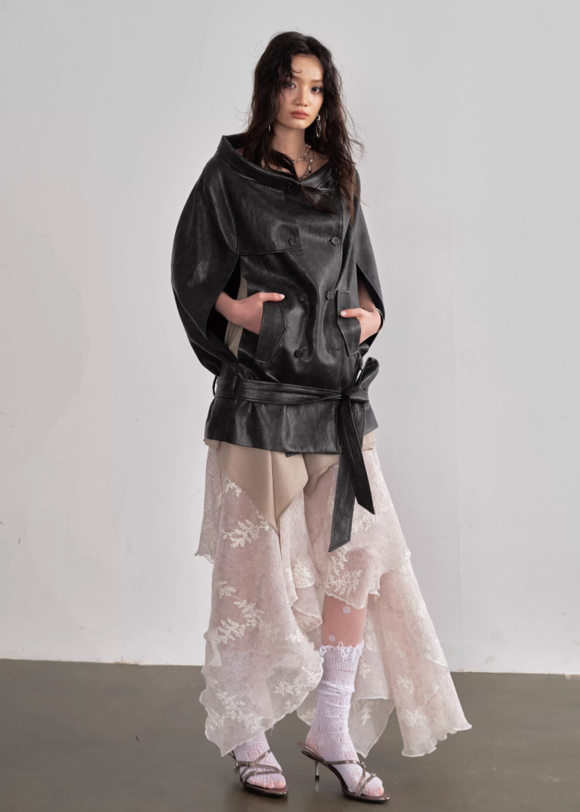 JNYLON faux leather cape jacket women, Korean stylish PU shawl jacket, modern Korean fashion cape coat, chic vintage faux leather outerwear, trendy Korean street chic jacket, oversized leather cape women, urban fashion layering PU jacket, stylish Korean fashion shawl coat, vintage romantic leather cape top women