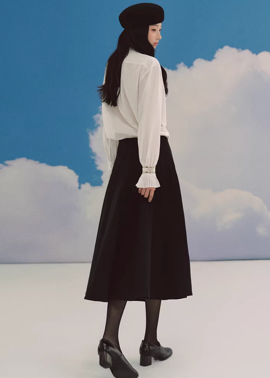 black midi skirt, pleated skirt women, a line midi skirt, umbrella skirt, elegant black skirt, korean fashion skirt, french style midi skirt, high waist skirt, minimalist skirt women, spring midi skirt, flowy skirt outfit, versatile black skirt, classic midi skirt, feminine silhouette skirt, chic pleated skirt, everyday elegant wear, parisian style clothing, soft structured skirt, refined women fashion, timeless wardrobe essential