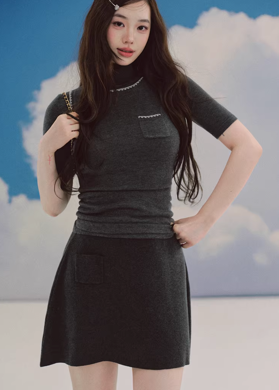 knit mini skirt, elastic waist skirt, a line mini skirt, korean fashion skirt, casual knit skirt, soft stretch skirt, irregular hem skirt, playful mini skirt, everyday skirt women, comfortable knit bottom, minimalist skirt style, spring mini skirt, versatile outfit piece, feminine casual look, cozy chic skirt, light knit skirt women, soft texture skirt, modern mini skirt, easy styling skirt, relaxed fit skirt
