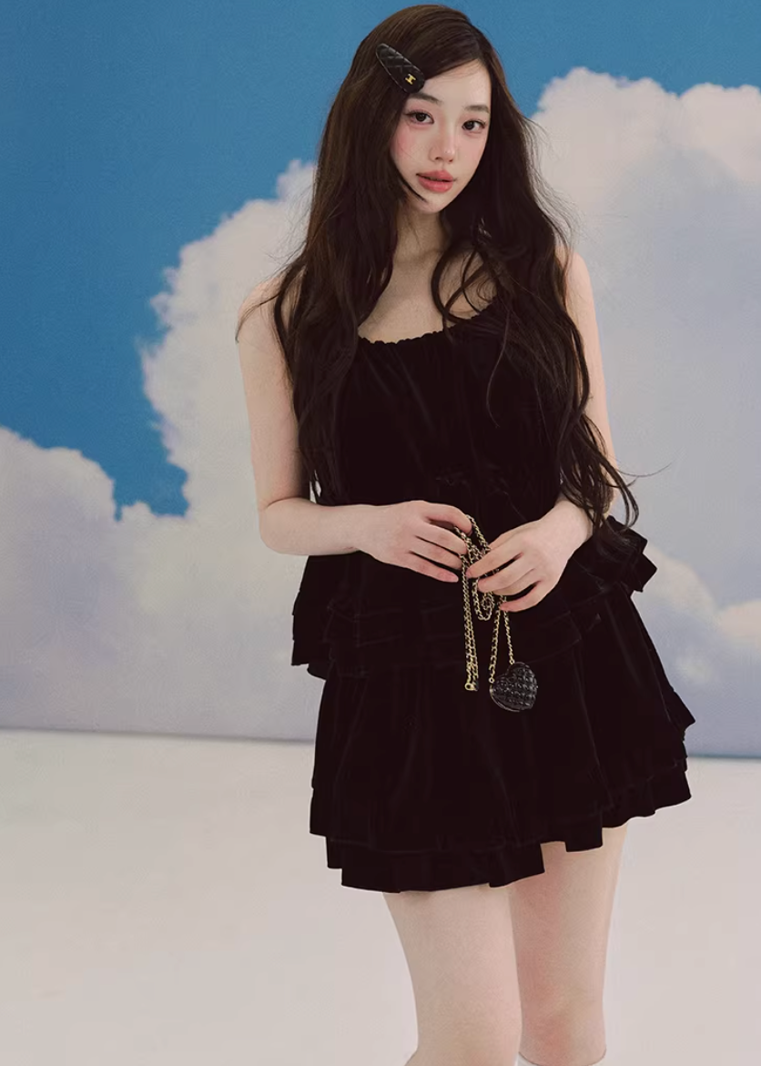 black velvet camisole, ruffle top women, ballet style top, korean fashion top, velvet camisole top, feminine layered top, dark romantic outfit, sleeveless velvet top, elegant black top, soft velvet blouse, tiered camisole, evening casual top, chic statement top, parisian inspired fashion, delicate strap top, lightweight velvet wear, modern feminine clothing, versatile going out top, aesthetic fashion top, refined romantic style