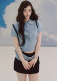 polo knit top women, embroidered sweater top, short sleeve knit, korean fashion top, fitted polo shirt women, spring knitwear, waist slimming top, elegant casual top, soft knit blouse, minimalist polo top, feminine knitwear, everyday chic outfit, blue knit top women, refined casual wear, lightweight sweater top, modern feminine clothing, versatile spring top, tailored knit shirt, aesthetic fashion top, parisian casual style