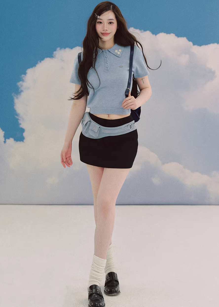 polo knit top women, embroidered sweater top, short sleeve knit, korean fashion top, fitted polo shirt women, spring knitwear, waist slimming top, elegant casual top, soft knit blouse, minimalist polo top, feminine knitwear, everyday chic outfit, blue knit top women, refined casual wear, lightweight sweater top, modern feminine clothing, versatile spring top, tailored knit shirt, aesthetic fashion top, parisian casual style