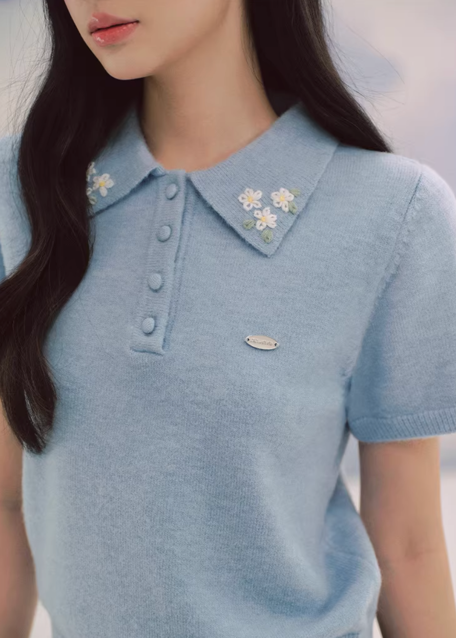 polo knit top women, embroidered sweater top, short sleeve knit, korean fashion top, fitted polo shirt women, spring knitwear, waist slimming top, elegant casual top, soft knit blouse, minimalist polo top, feminine knitwear, everyday chic outfit, blue knit top women, refined casual wear, lightweight sweater top, modern feminine clothing, versatile spring top, tailored knit shirt, aesthetic fashion top, parisian casual style