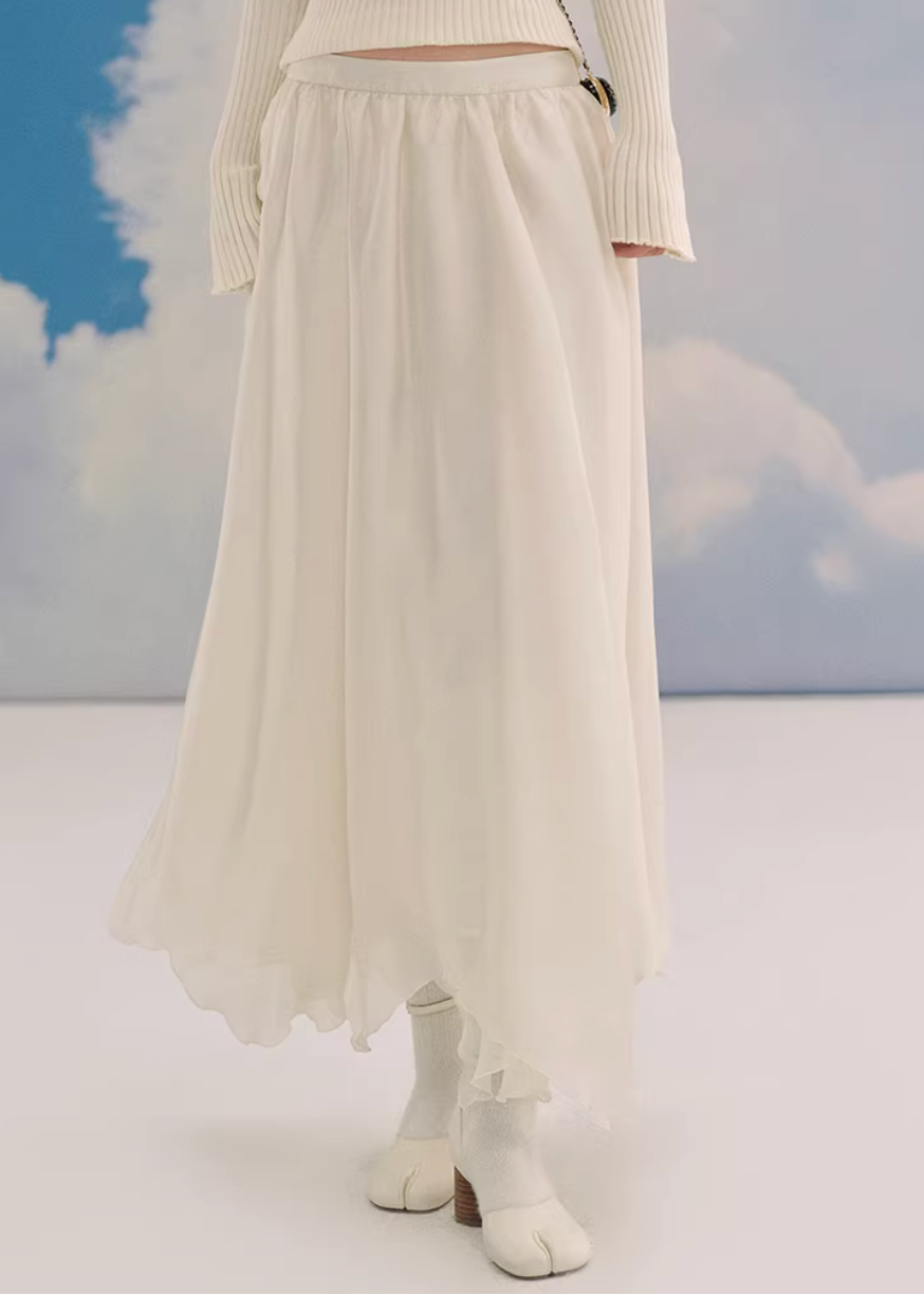 sheer maxi skirt, chiffon skirt women, irregular hem skirt, korean fashion skirt, flowy long skirt, a line maxi skirt, elastic waist skirt, feminine chiffon skirt, spring long skirt, elegant ivory skirt, layered sheer skirt, romantic outfit skirt, soft aesthetic fashion, lightweight summer skirt, parisian style skirt, modern feminine clothing, versatile long skirt, airy fabric skirt, graceful movement skirt, refined casual elegance