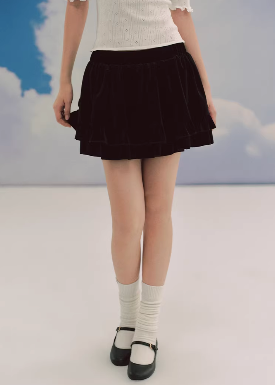 black velvet skirt, ballet mini skirt, tiered skirt women, korean fashion skirt, velvet mini skirt, flared mini skirt, feminine black skirt, soft velvet skirt, slimming mini skirt, playful chic skirt, elegant mini skirt, versatile outfit skirt, layered skirt women, aesthetic fashion skirt, modern feminine clothing, parisian style mini skirt, going out skirt, casual chic mini, refined black skirt, soft texture skirt