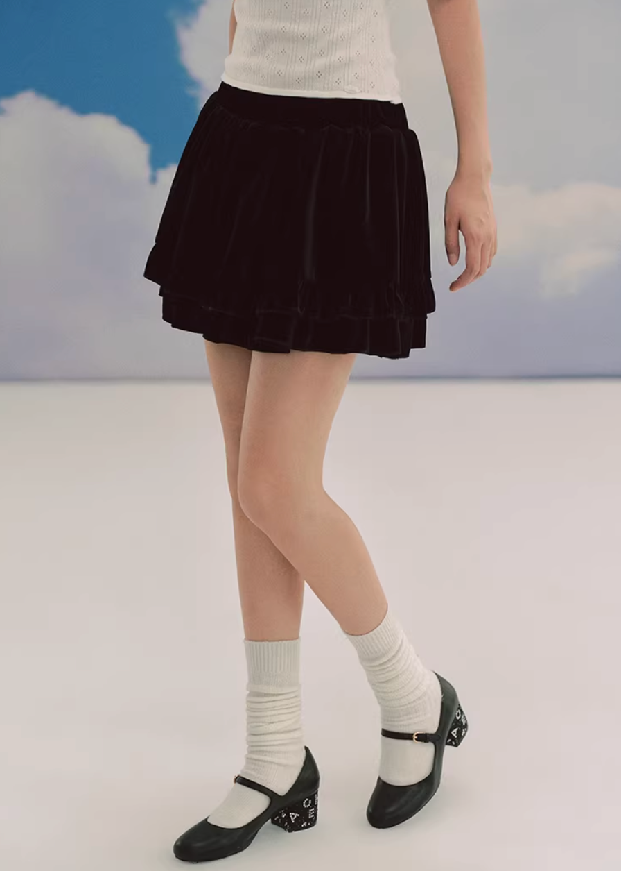 black velvet skirt, ballet mini skirt, tiered skirt women, korean fashion skirt, velvet mini skirt, flared mini skirt, feminine black skirt, soft velvet skirt, slimming mini skirt, playful chic skirt, elegant mini skirt, versatile outfit skirt, layered skirt women, aesthetic fashion skirt, modern feminine clothing, parisian style mini skirt, going out skirt, casual chic mini, refined black skirt, soft texture skirt