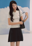 ivory polo knit top, slim fit knit tee, short sleeve knit women, korean fashion top, ribbed polo shirt women, minimalist knit top, feminine casual top, lightweight knitwear, everyday elegant outfit, soft knit blouse, parisian style top, fitted knit shirt, breathable summer knit, versatile basic top, refined casual wear, modern feminine clothing, chic simple top, aesthetic fashion knit, clean line top women, wardrobe essential knit