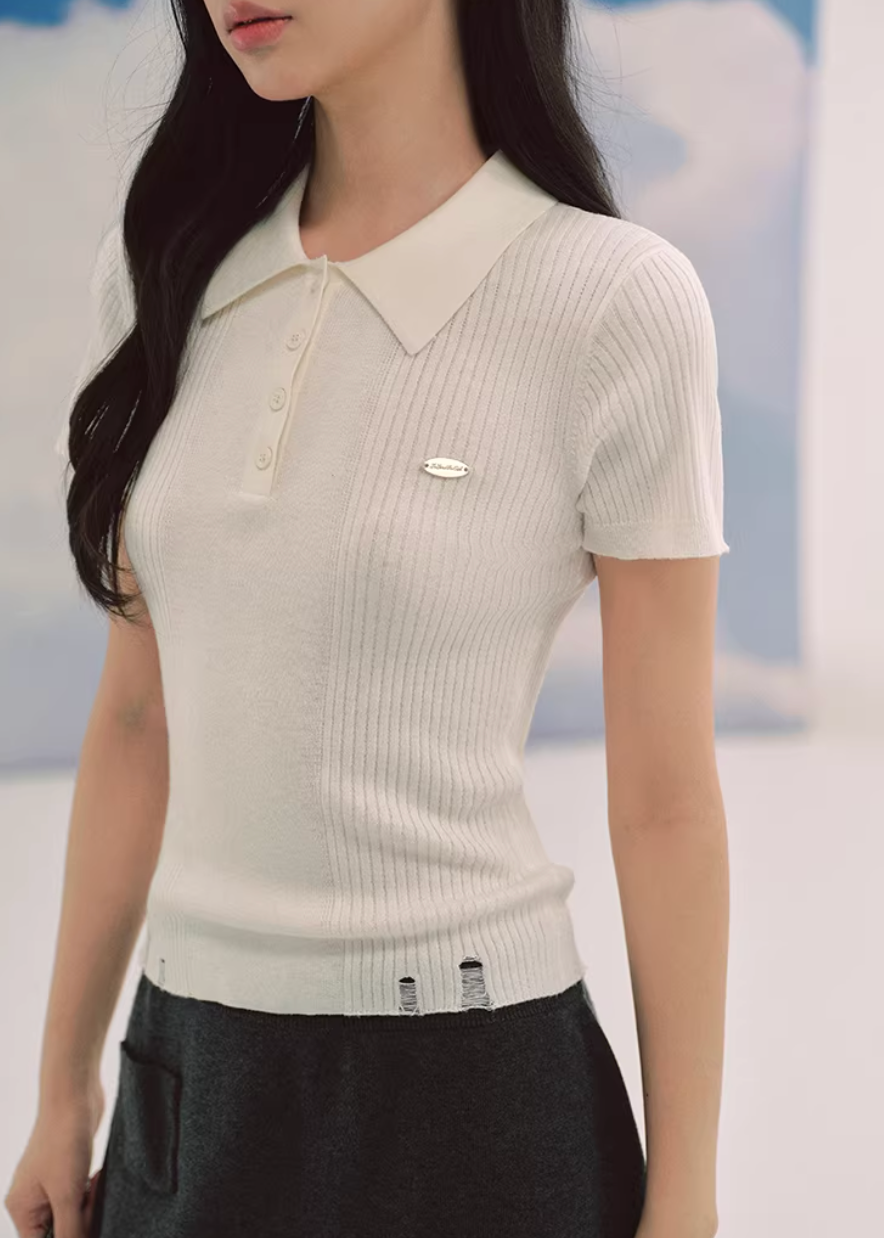 ivory polo knit top, slim fit knit tee, short sleeve knit women, korean fashion top, ribbed polo shirt women, minimalist knit top, feminine casual top, lightweight knitwear, everyday elegant outfit, soft knit blouse, parisian style top, fitted knit shirt, breathable summer knit, versatile basic top, refined casual wear, modern feminine clothing, chic simple top, aesthetic fashion knit, clean line top women, wardrobe essential knit