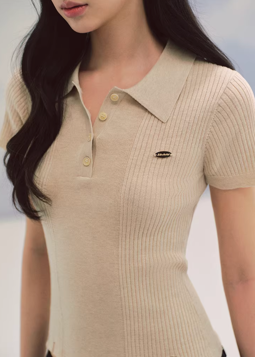 ivory polo knit top, slim fit knit tee, short sleeve knit women, korean fashion top, ribbed polo shirt women, minimalist knit top, feminine casual top, lightweight knitwear, everyday elegant outfit, soft knit blouse, parisian style top, fitted knit shirt, breathable summer knit, versatile basic top, refined casual wear, modern feminine clothing, chic simple top, aesthetic fashion knit, clean line top women, wardrobe essential knit