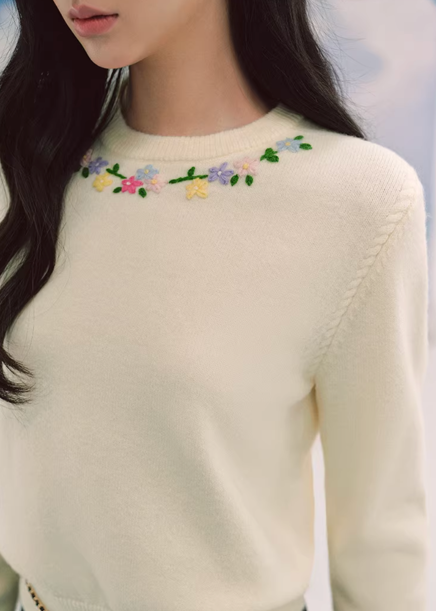 embroidered sweater women, ivory knit top, crew neck sweater women, korean fashion knit, spring knitwear, feminine sweater top, soft knit blouse, elegant casual sweater, lightweight knit top, minimalist sweater women, versatile everyday knit, parisian style clothing, refined knitwear women, slim fit sweater, delicate embroidery top, modern feminine clothing, chic casual outfit, aesthetic fashion knit, soft luxury sweater, timeless wardrobe knit