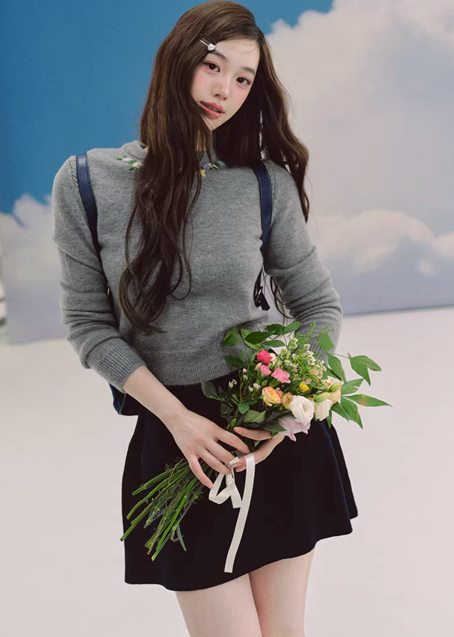 embroidered sweater women, ivory knit top, crew neck sweater women, korean fashion knit, spring knitwear, feminine sweater top, soft knit blouse, elegant casual sweater, lightweight knit top, minimalist sweater women, versatile everyday knit, parisian style clothing, refined knitwear women, slim fit sweater, delicate embroidery top, modern feminine clothing, chic casual outfit, aesthetic fashion knit, soft luxury sweater, timeless wardrobe knit