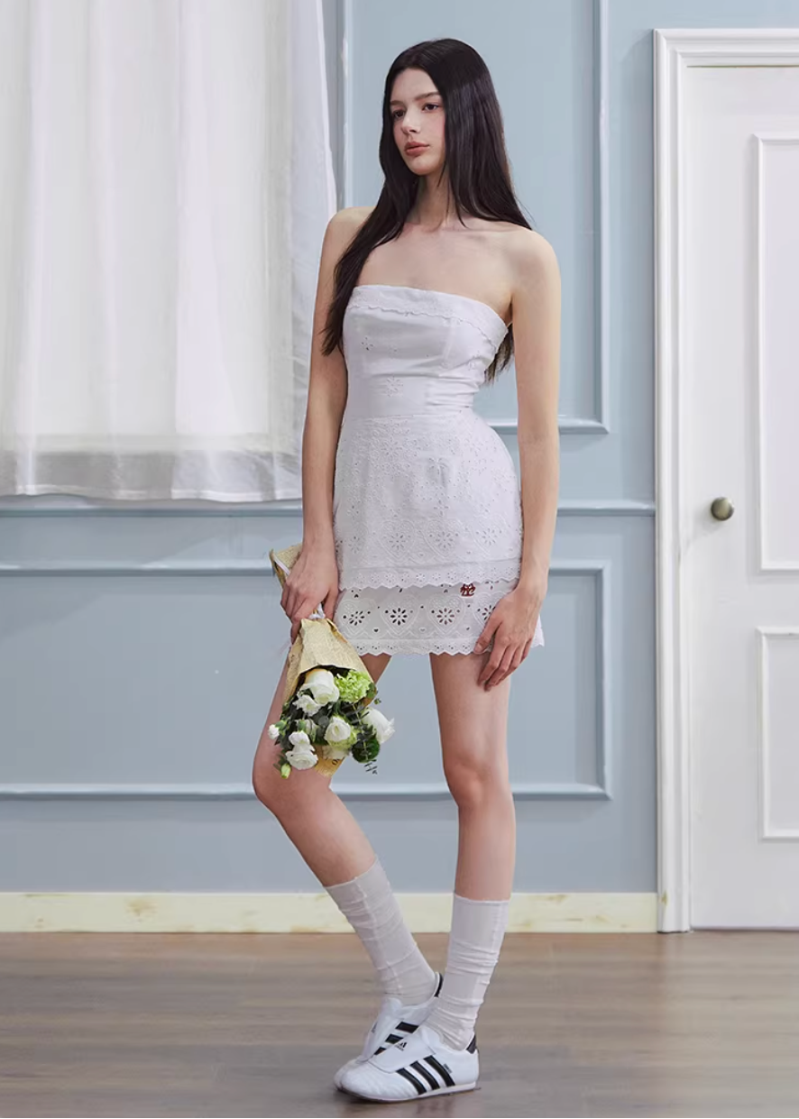strapless white dress, bandeau mini dress, embroidered white dress, korean fashion dress, ivory mini dress, minimalist strapless dress, fitted mini dress women, elegant summer dress, non slip bandeau dress, clean silhouette dress, feminine white outfit, chic mini dress, parisian style dress, refined minimal dress, spring summer dress women, aesthetic fashion dress, modern feminine clothing, versatile party dress, soft elegant dress, statement white dress