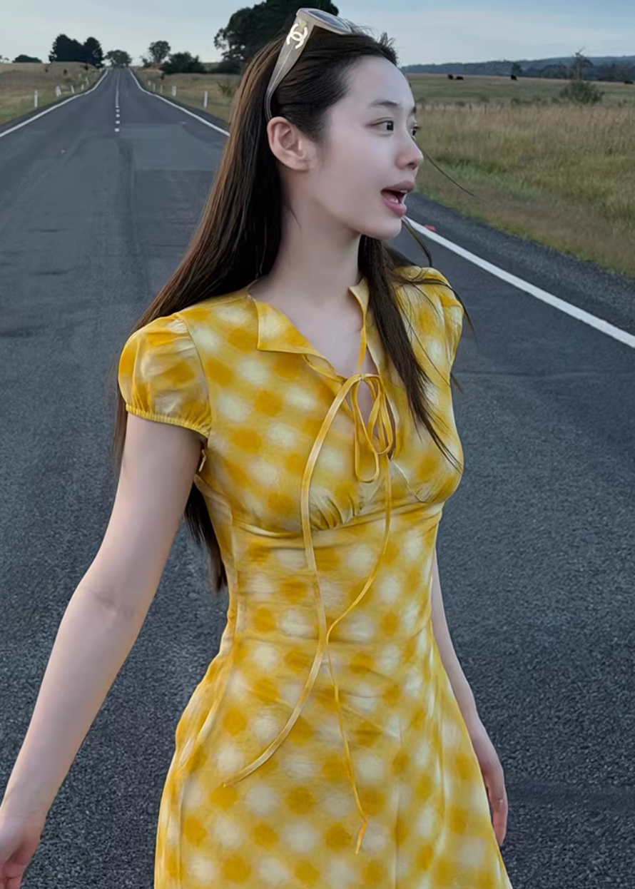 checkered tea dress, vintage summer dress, yellow midi dress, korean fashion dress, resort style dress, picnic dress women, french vintage dress, feminine summer outfit, lightweight cotton dress, flattering waist dress, casual romantic dress, aesthetic fashion dress, parisian style clothing, soft girl summer dress, breathable summer dress, elegant casual wear, modern feminine clothing, vacation outfit dress, chic everyday dress, warm tone dress