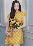 checkered tea dress, vintage summer dress, yellow midi dress, korean fashion dress, resort style dress, picnic dress women, french vintage dress, feminine summer outfit, lightweight cotton dress, flattering waist dress, casual romantic dress, aesthetic fashion dress, parisian style clothing, soft girl summer dress, breathable summer dress, elegant casual wear, modern feminine clothing, vacation outfit dress, chic everyday dress, warm tone dress