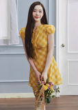 checkered tea dress, vintage summer dress, yellow midi dress, korean fashion dress, resort style dress, picnic dress women, french vintage dress, feminine summer outfit, lightweight cotton dress, flattering waist dress, casual romantic dress, aesthetic fashion dress, parisian style clothing, soft girl summer dress, breathable summer dress, elegant casual wear, modern feminine clothing, vacation outfit dress, chic everyday dress, warm tone dress