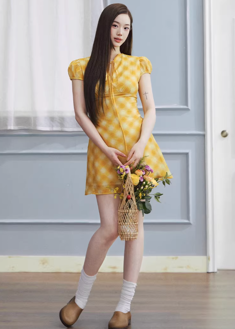 checkered tea dress, vintage summer dress, yellow midi dress, korean fashion dress, resort style dress, picnic dress women, french vintage dress, feminine summer outfit, lightweight cotton dress, flattering waist dress, casual romantic dress, aesthetic fashion dress, parisian style clothing, soft girl summer dress, breathable summer dress, elegant casual wear, modern feminine clothing, vacation outfit dress, chic everyday dress, warm tone dress