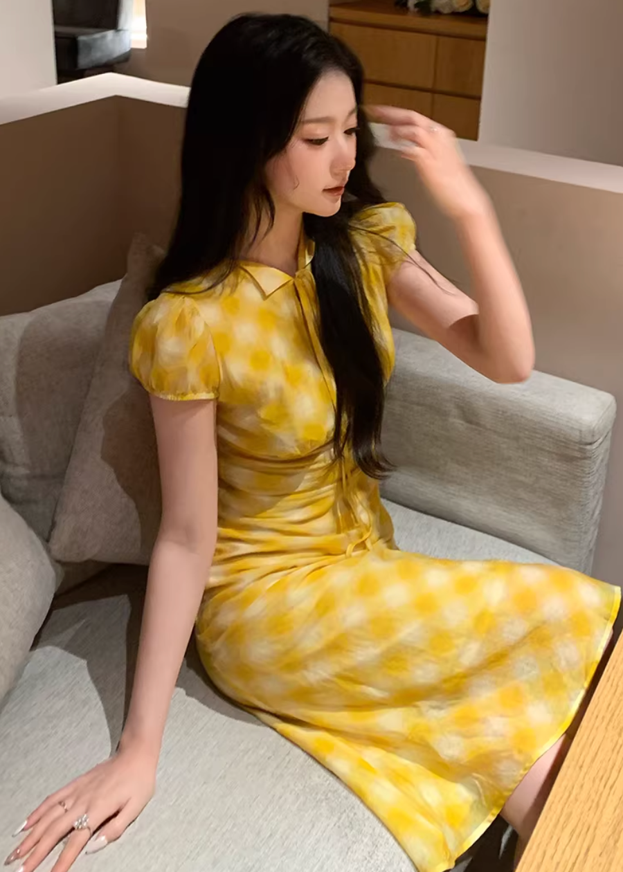 checkered tea dress, vintage summer dress, yellow midi dress, korean fashion dress, resort style dress, picnic dress women, french vintage dress, feminine summer outfit, lightweight cotton dress, flattering waist dress, casual romantic dress, aesthetic fashion dress, parisian style clothing, soft girl summer dress, breathable summer dress, elegant casual wear, modern feminine clothing, vacation outfit dress, chic everyday dress, warm tone dress