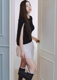 lyocell knit top, cape style top women, sleeveless knit top, korean fashion top, minimalist summer top, draped knit top, lightweight knitwear, breathable fabric top, modern feminine clothing, casual elegant top, soft knit blouse, parisian style clothing, versatile summer outfit, aesthetic fashion top, refined casual wear, clean line top women, flowy knit top, chic everyday top, simple design top, comfortable summer knit