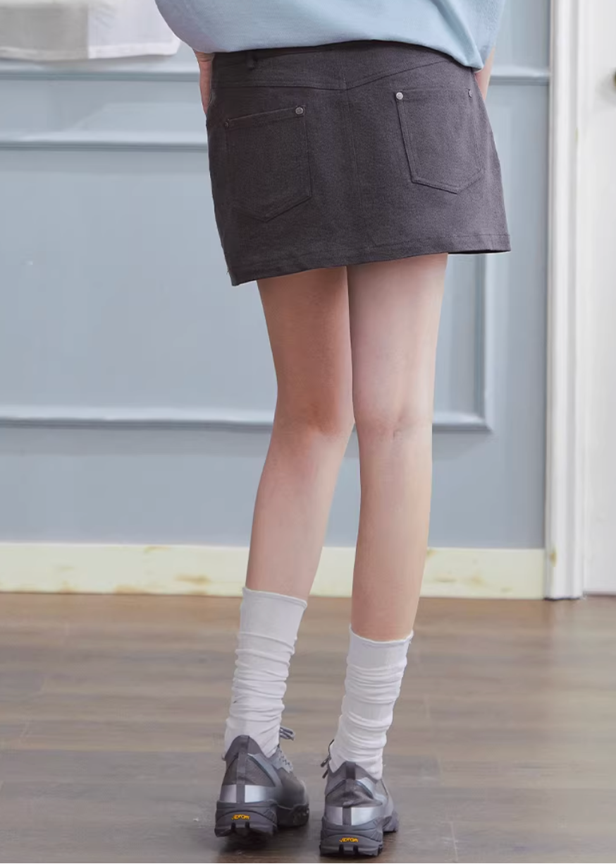 denim mini skirt women, low rise denim skirt, washed denim skirt, korean fashion skirt, hip hugging skirt, casual mini skirt women, vintage wash denim, everyday denim skirt, minimalist skirt women, chic street style skirt, modern feminine clothing, versatile mini skirt, spring denim outfit, aesthetic fashion skirt, soft denim skirt, simple design skirt, fitted mini skirt women, urban style clothing, clean silhouette skirt, essential wardrobe piece