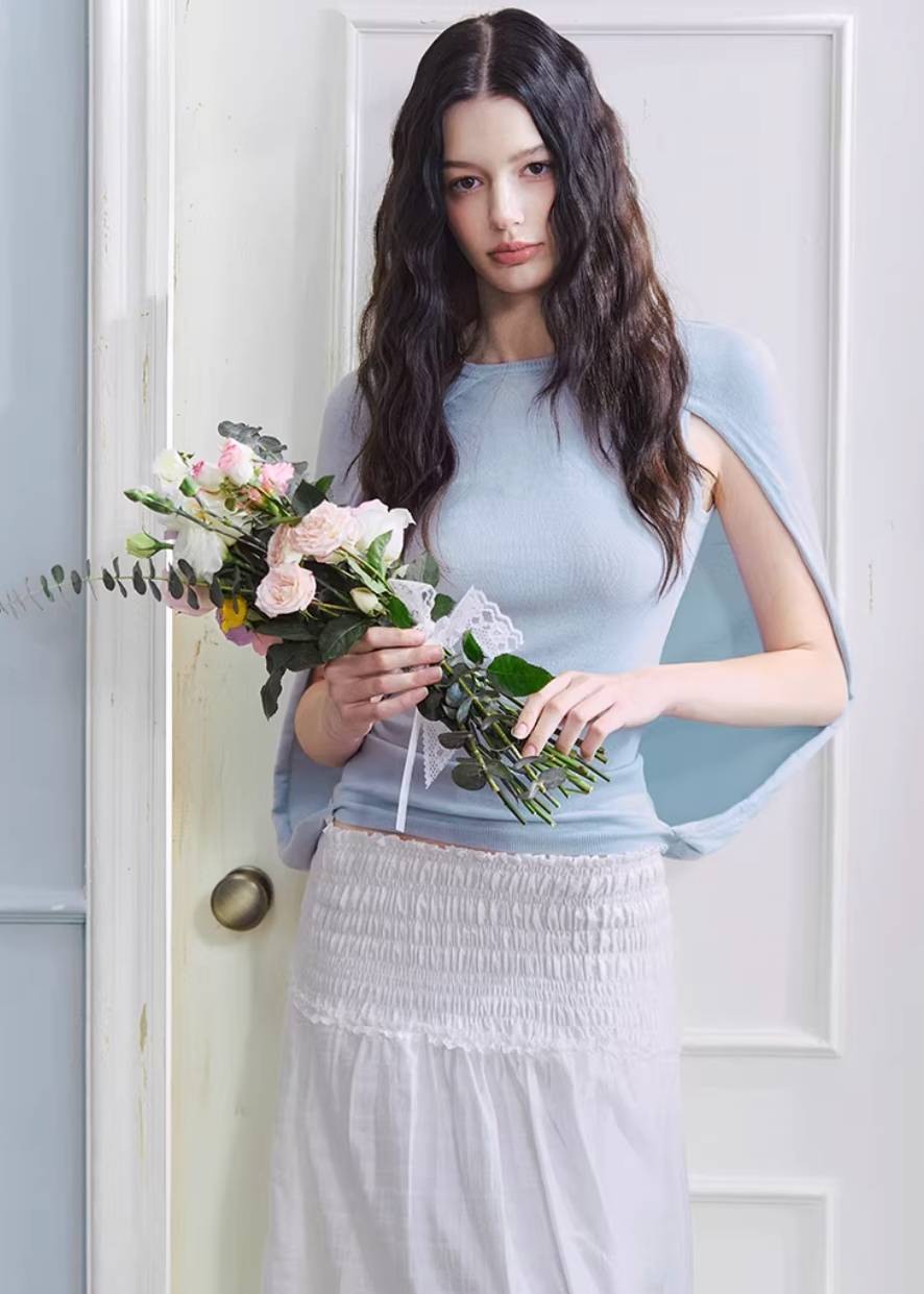 white maxi skirt, pleated long skirt, korean fashion skirt, flowy maxi skirt, elastic waist skirt, feminine long skirt, spring summer skirt, lightweight skirt women, elegant casual outfit, parisian style clothing, soft aesthetic skirt, tiered maxi skirt, breathable fabric skirt, modern feminine clothing, versatile long skirt, chic everyday outfit, refined casual wear, airy fabric skirt, graceful silhouette skirt, minimal elegant skirt