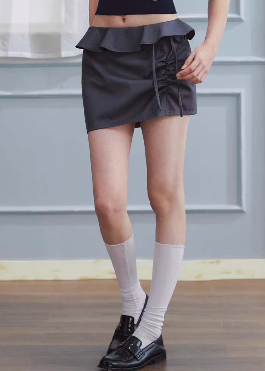 ruffled mini skirt women, low rise skirt, shirred mini skirt, korean fashion skirt, hip hugging skirt, spring outfit ideas, feminine mini skirt, casual chic skirt, aesthetic fashion skirt, modern feminine clothing, versatile mini skirt, lightweight skirt women, stylish short skirt, parisian style clothing, refined casual wear, body contour skirt, clean silhouette skirt, trendy mini skirt, everyday outfit skirt, spring mini skirt