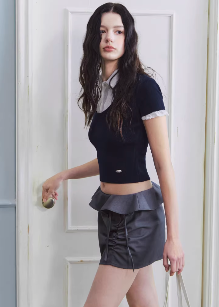 ruffled mini skirt women, low rise skirt, shirred mini skirt, korean fashion skirt, hip hugging skirt, spring outfit ideas, feminine mini skirt, casual chic skirt, aesthetic fashion skirt, modern feminine clothing, versatile mini skirt, lightweight skirt women, stylish short skirt, parisian style clothing, refined casual wear, body contour skirt, clean silhouette skirt, trendy mini skirt, everyday outfit skirt, spring mini skirt