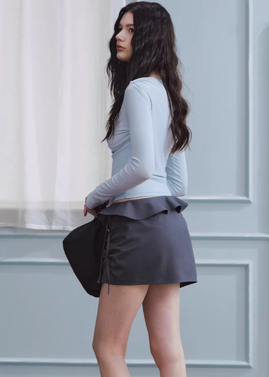 ruffled mini skirt women, low rise skirt, shirred mini skirt, korean fashion skirt, hip hugging skirt, spring outfit ideas, feminine mini skirt, casual chic skirt, aesthetic fashion skirt, modern feminine clothing, versatile mini skirt, lightweight skirt women, stylish short skirt, parisian style clothing, refined casual wear, body contour skirt, clean silhouette skirt, trendy mini skirt, everyday outfit skirt, spring mini skirt