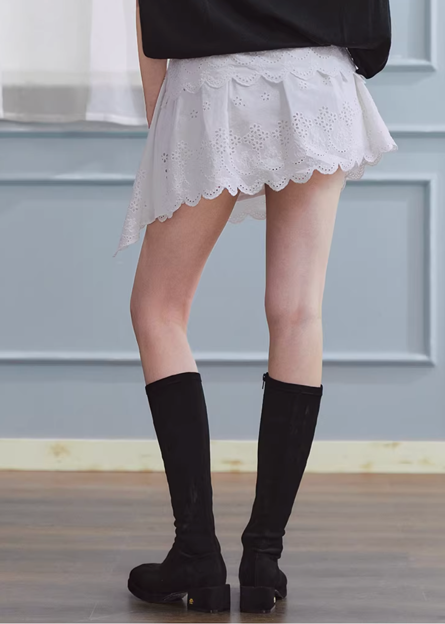 white embroidered skirt, a line mini skirt, cut out lace skirt, korean fashion skirt, spring outfits 2026, feminine mini skirt, asymmetrical skirt women, cotton skirt women, lightweight summer skirt, aesthetic fashion skirt, chic everyday outfit, modern feminine clothing, versatile white skirt, parisian style clothing, refined casual wear, delicate lace skirt, soft girl aesthetic outfit, breathable cotton skirt, elegant mini skirt, spring wardrobe essential