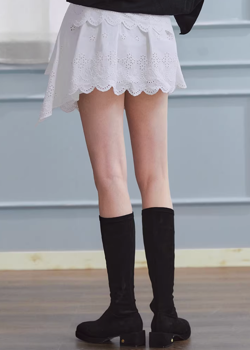 white embroidered skirt, a line mini skirt, cut out lace skirt, korean fashion skirt, spring outfits 2026, feminine mini skirt, asymmetrical skirt women, cotton skirt women, lightweight summer skirt, aesthetic fashion skirt, chic everyday outfit, modern feminine clothing, versatile white skirt, parisian style clothing, refined casual wear, delicate lace skirt, soft girl aesthetic outfit, breathable cotton skirt, elegant mini skirt, spring wardrobe essential