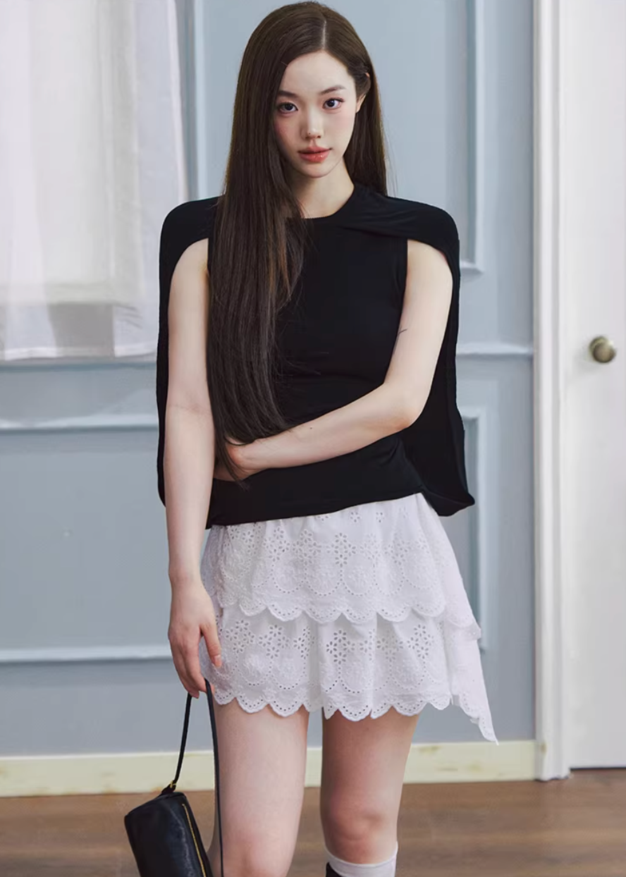 white embroidered skirt, a line mini skirt, cut out lace skirt, korean fashion skirt, spring outfits 2026, feminine mini skirt, asymmetrical skirt women, cotton skirt women, lightweight summer skirt, aesthetic fashion skirt, chic everyday outfit, modern feminine clothing, versatile white skirt, parisian style clothing, refined casual wear, delicate lace skirt, soft girl aesthetic outfit, breathable cotton skirt, elegant mini skirt, spring wardrobe essential