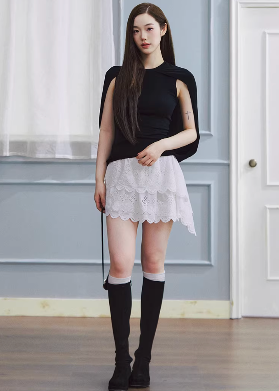 white embroidered skirt, a line mini skirt, cut out lace skirt, korean fashion skirt, spring outfits 2026, feminine mini skirt, asymmetrical skirt women, cotton skirt women, lightweight summer skirt, aesthetic fashion skirt, chic everyday outfit, modern feminine clothing, versatile white skirt, parisian style clothing, refined casual wear, delicate lace skirt, soft girl aesthetic outfit, breathable cotton skirt, elegant mini skirt, spring wardrobe essential