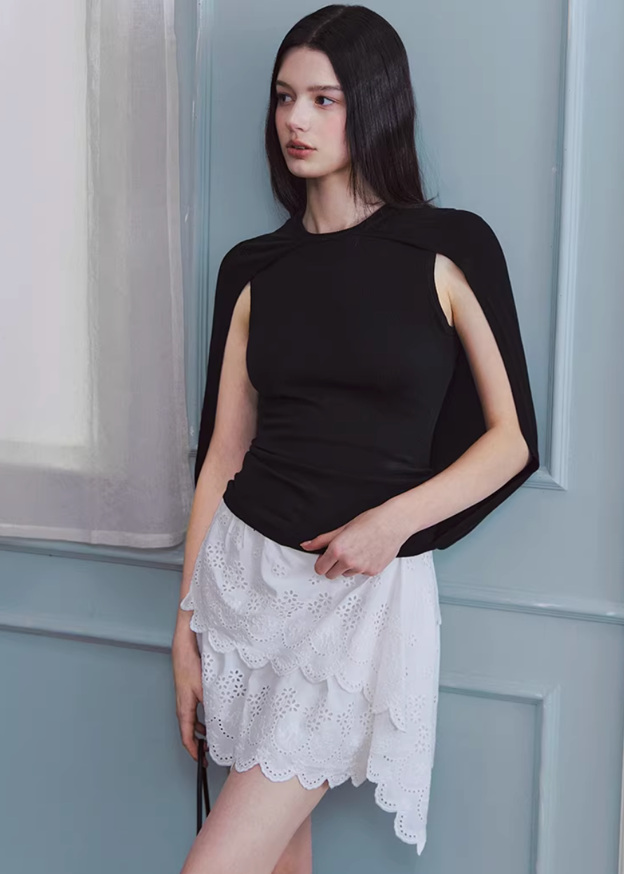 white embroidered skirt, a line mini skirt, cut out lace skirt, korean fashion skirt, spring outfits 2026, feminine mini skirt, asymmetrical skirt women, cotton skirt women, lightweight summer skirt, aesthetic fashion skirt, chic everyday outfit, modern feminine clothing, versatile white skirt, parisian style clothing, refined casual wear, delicate lace skirt, soft girl aesthetic outfit, breathable cotton skirt, elegant mini skirt, spring wardrobe essential