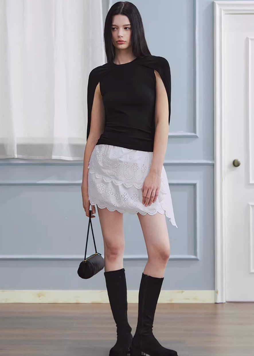 white embroidered skirt, a line mini skirt, cut out lace skirt, korean fashion skirt, spring outfits 2026, feminine mini skirt, asymmetrical skirt women, cotton skirt women, lightweight summer skirt, aesthetic fashion skirt, chic everyday outfit, modern feminine clothing, versatile white skirt, parisian style clothing, refined casual wear, delicate lace skirt, soft girl aesthetic outfit, breathable cotton skirt, elegant mini skirt, spring wardrobe essential