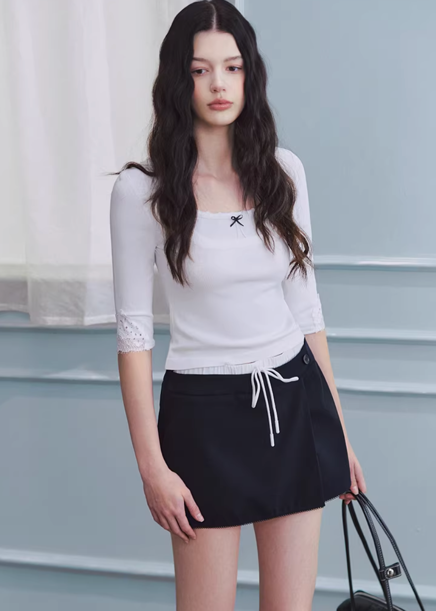 square neck knit top, lace trim top women, korean fashion top, slim fit knit top, spring outfit ideas, half sleeve knit women, feminine casual top, lightweight knitwear, aesthetic fashion top, modern feminine clothing, versatile everyday top, parisian style clothing, fitted knit blouse, soft knit top women, chic everyday outfit, clean line top, refined casual wear, delicate detail knit, spring wardrobe essential, minimal feminine top