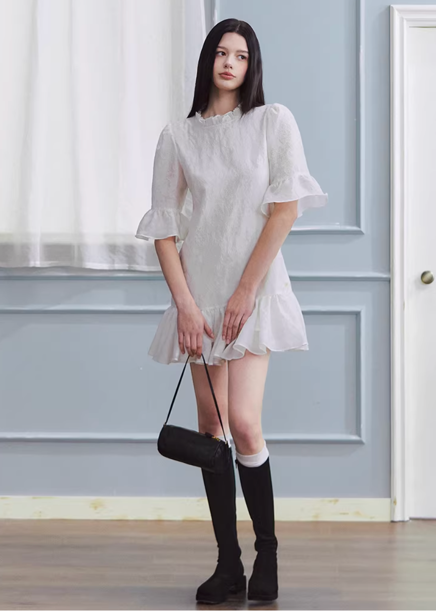 white mini dress women, jacquard dress women, ruffle dress spring, korean fashion dress, spring outfits 2026, feminine mini dress, textured white dress, aesthetic fashion dress, lightweight summer dress, chic everyday outfit, modern feminine clothing, elegant casual dress, parisian style clothing, versatile spring dress, soft girl aesthetic dress, flared mini dress, refined casual wear, delicate texture dress, romantic white dress, spring wardrobe essential