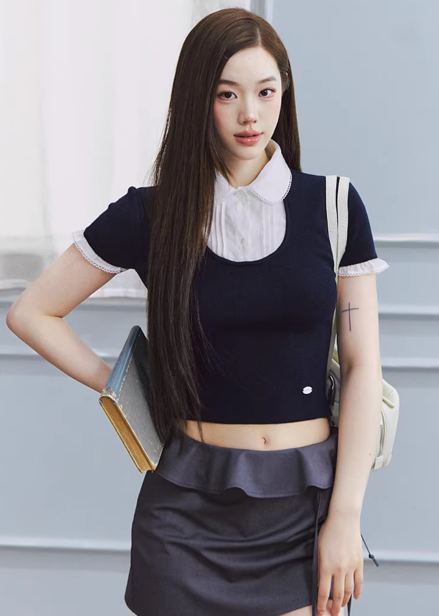 layered knit top women, fake two piece top, shirt collar knit, korean fashion top, spring outfit ideas, slim fit knit top, short sleeve knit women, feminine casual top, lightweight knitwear, aesthetic fashion top, modern feminine clothing, versatile everyday top, parisian style clothing, fitted knit blouse, clean line top, refined casual wear, minimal style top, chic everyday outfit, spring wardrobe essential, contrast collar top