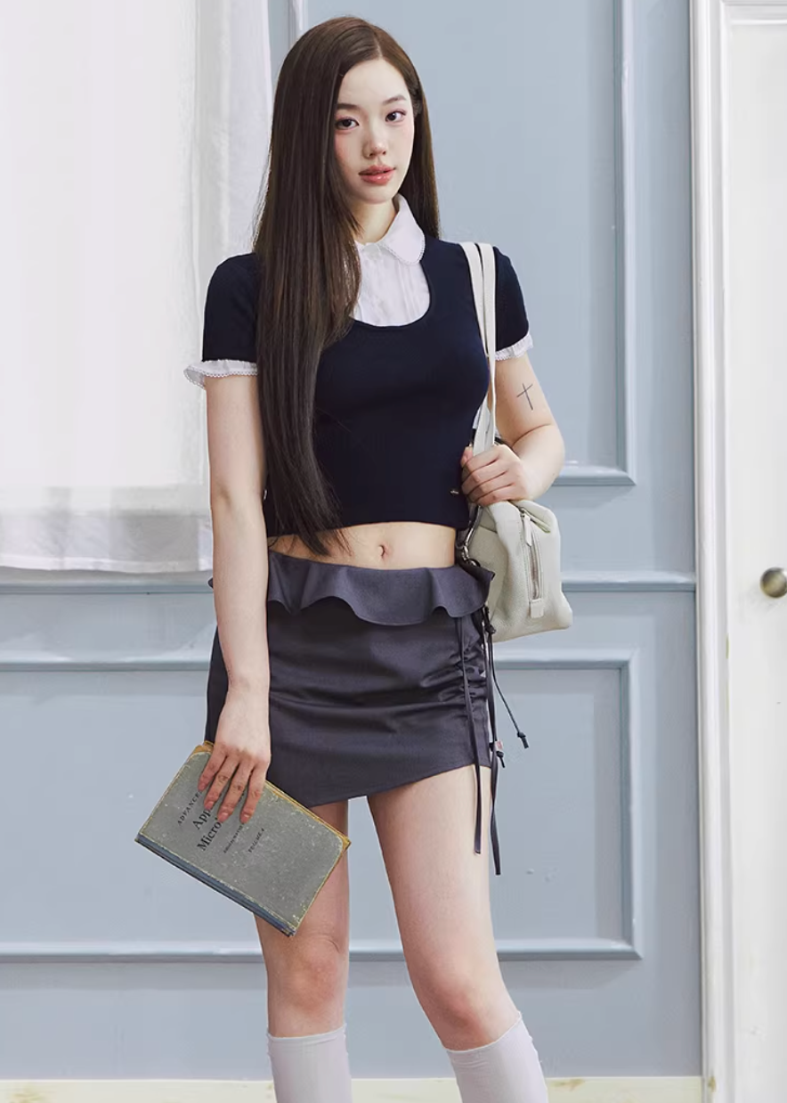 layered knit top women, fake two piece top, shirt collar knit, korean fashion top, spring outfit ideas, slim fit knit top, short sleeve knit women, feminine casual top, lightweight knitwear, aesthetic fashion top, modern feminine clothing, versatile everyday top, parisian style clothing, fitted knit blouse, clean line top, refined casual wear, minimal style top, chic everyday outfit, spring wardrobe essential, contrast collar top