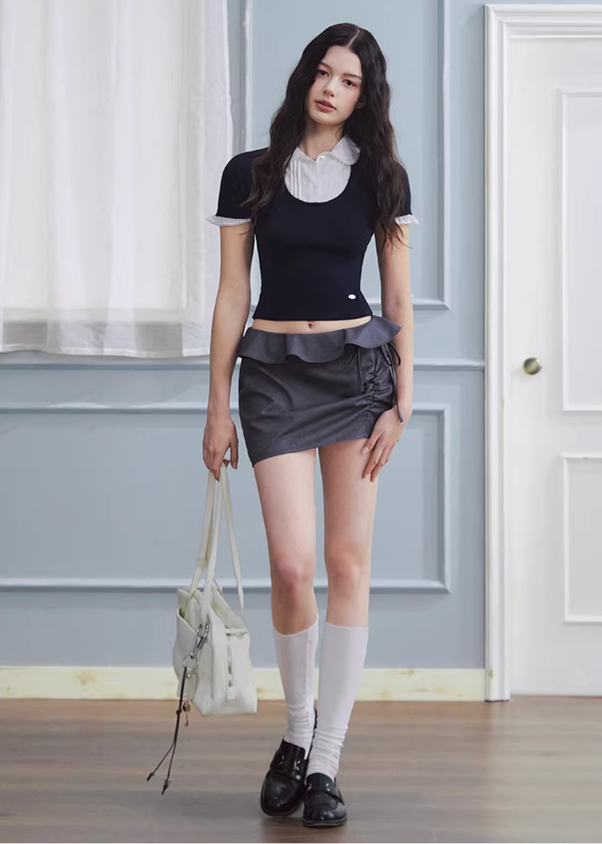 layered knit top women, fake two piece top, shirt collar knit, korean fashion top, spring outfit ideas, slim fit knit top, short sleeve knit women, feminine casual top, lightweight knitwear, aesthetic fashion top, modern feminine clothing, versatile everyday top, parisian style clothing, fitted knit blouse, clean line top, refined casual wear, minimal style top, chic everyday outfit, spring wardrobe essential, contrast collar top